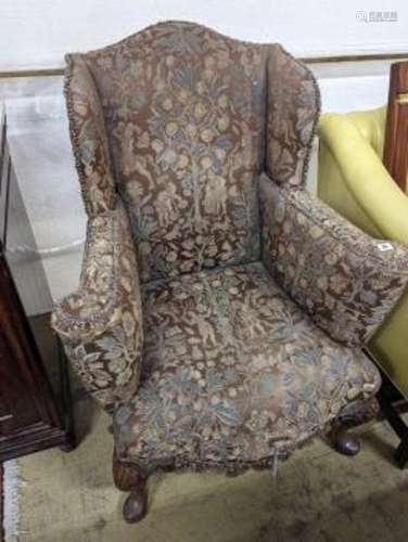 A Queen Anne revival upholstered walnut wing armchair, width...