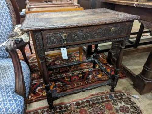 An 18th century carved oak side table, width 71cm, depth 47c...