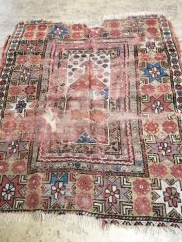 An antique Turkish Melas rug, 128 x 107cm