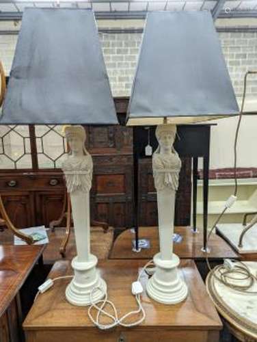 A pair of painted wood figural table lamps, height excluding...