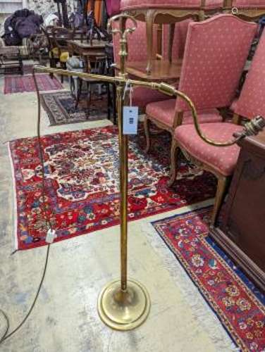 An Edwardian brass telescopic floor lamp converted to electr...