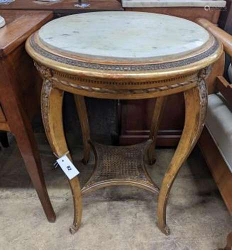 A French caned giltwood circular centre table with reconstit...