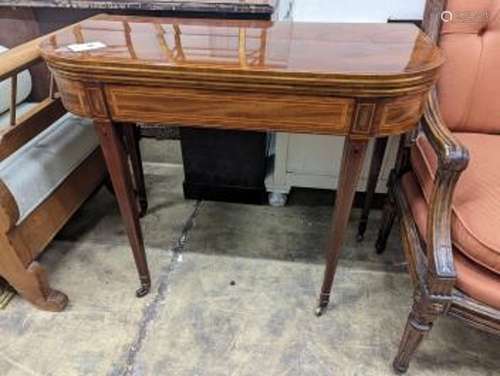 A Regency banded mahogany D shaped folding card table, width...