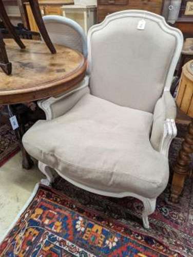 A French painted upholstered armchair, width 71cm, depth 70c...