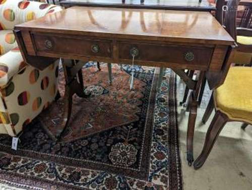 A Regency style banded mahogany sofa table, width 86cm, dept...