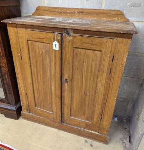 A Victorian small scumbled pine hall cabinet with painted si...