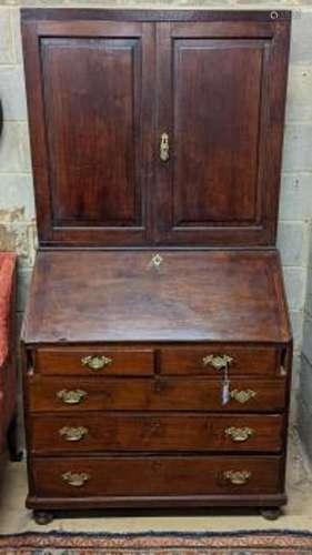 A George III mahogany bureau cabinet, width 102cm, depth 55c...