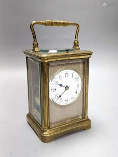 A French brass repeating carriage clock with key. 13.5cm