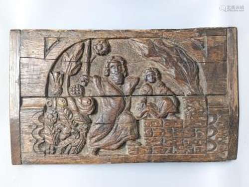 A 17th century style sunken-carved oak panel 37x61cm