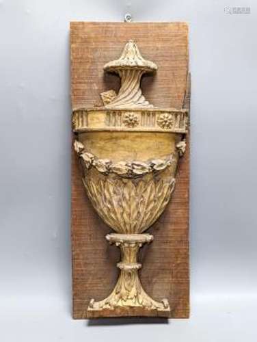 An 18th/19th century carved wood and gilt gesso urn relief, ...