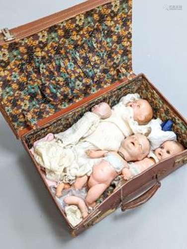 A 19th century German bisque-headed doll and three compositi...