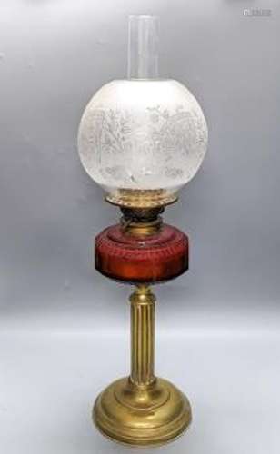 A Victorian brass oil lamp with etched glass shade and cranb...