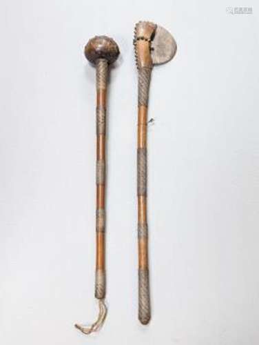 A Zulu hardwood, braided wire and studded knobkerrie and a s...