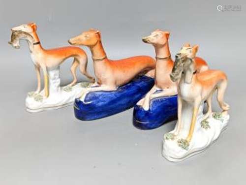 Two pairs of Staffordshire greyhounds, largest 19 cm long