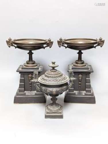 A pair of bronze tazzas on architectural slate bases, c.1900...