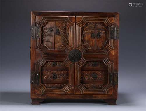 A Chinese Carved Huanghuali Cabinet