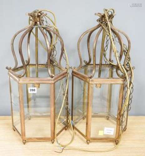 A pair of brass hexagonal lanterns 54cm