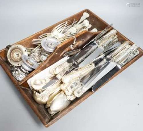 A 19th century cutlery carrier and a large quantity of Kings...