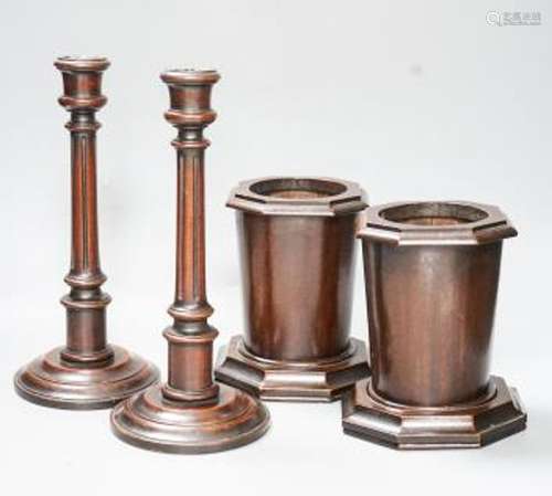 A pair of Victorian fluted mahogany candlesticks and a pair ...