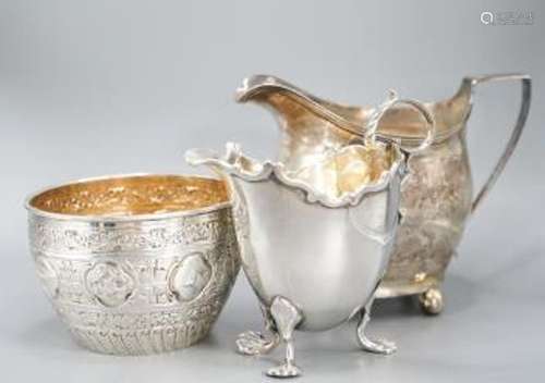 A Victorian repousse silver sugar bowl, a George III silver ...