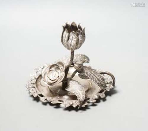 A George IV silver ‘rose’ chamberstick by Sampson Mordan and...