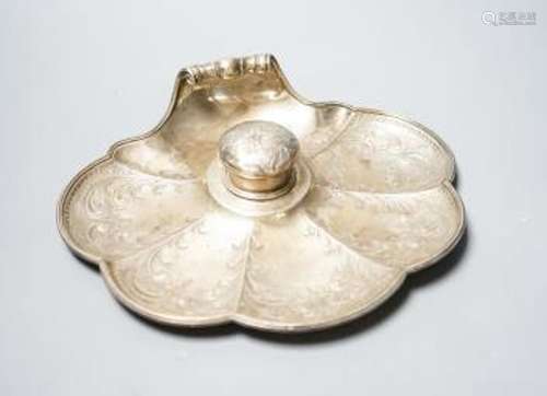 A late Victorian engraved silver shell shaped inkstand with ...