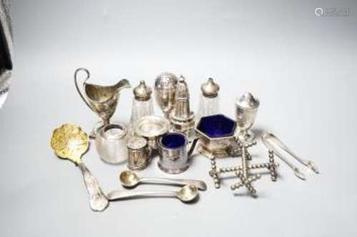 A group of small silver including condiments, match strike, ...