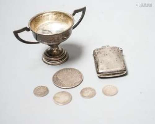 A silver vesta case, a small silver trophy cup and five asso...