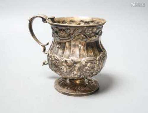 A George IV embossed silver christening mug, London, 1825, h...