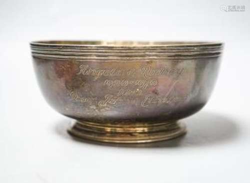 A modern silver circular presentation bowl, Garrard & Co Ltd...