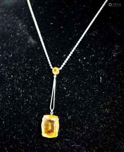 A white metal and two stone citrine set drop line pendant ne...