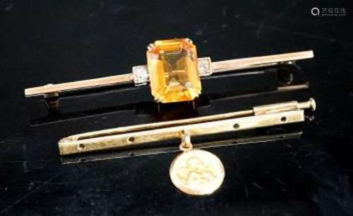 A yellow metal, single stone citrine and two stone diamond s...