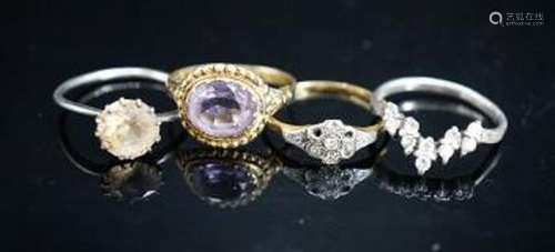 A Victorian yellow metal and amethyst dress ring (shank a.f....