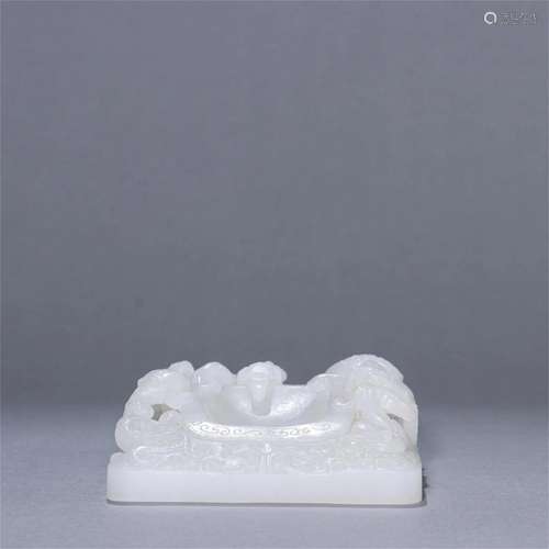 A Chinese Carved Jade Beast Patterned Brush Palette