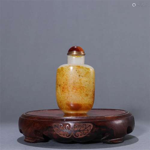 A Chinese Carved Jade Snuff Bottle