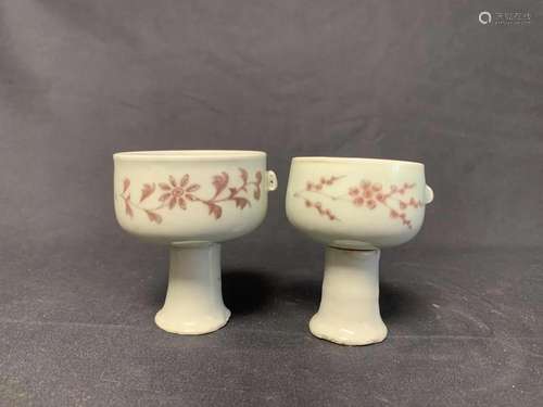 PAIR OF UNDERGLAZED RED ROTATING STEM CUPS