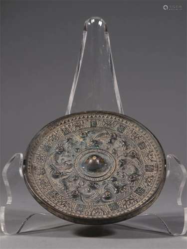 A Chinese Bronze Mirror with Beast Pattern