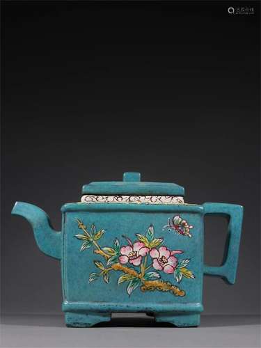 A Chinese Carved Yixing Zisha Teapot with Flower