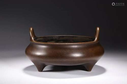 A DOUBLE-EAR TRIPOD BRONZE CENSER