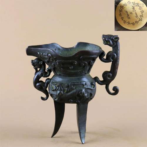 A Chinese Bronze Beast Shaped Wine Cup