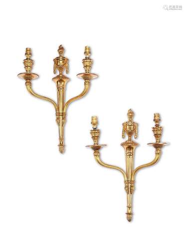 A pair of early 20th century neo-classical gilt bronze twin-...