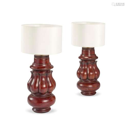 A pair of mahogany table lamps with shades