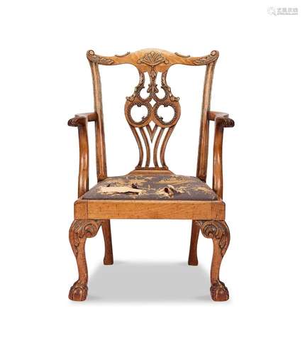 An early 20th century Chippendale style mahogany carved chil...