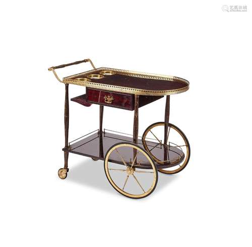 A 1950's mahogany and brass two-tier cocktail trolley