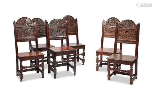 A well matched set of six Charles II oak solid-seat chairs, ...