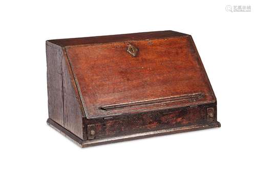 An early 18th century oak table top bureau