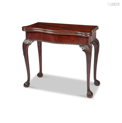 A George III mahogany serpentine card table