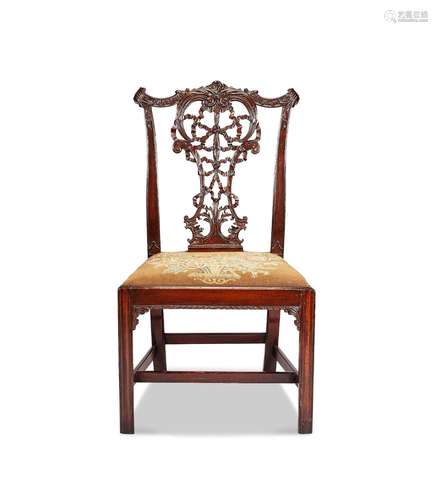 A 19th century Chippendale style carved mahogany dining chai...