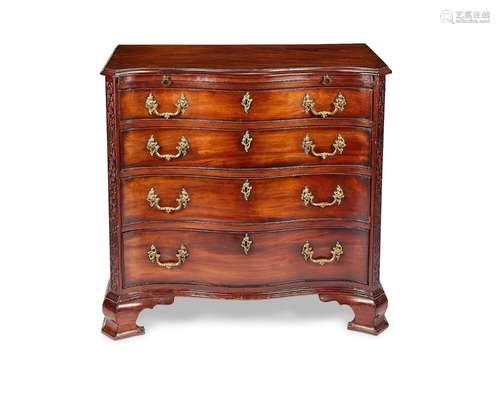 A small George III mahogany serpentine chest