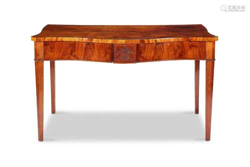 A George III mahogany serpentine serving table